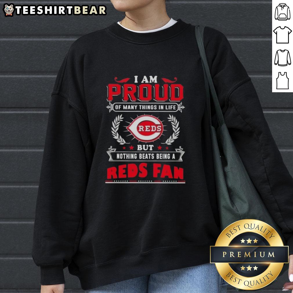Cozy Cincinnati Reds fan sweatshirt with 'I Am Proud Of Many Things In Life' design, perfect for showing team spirit.