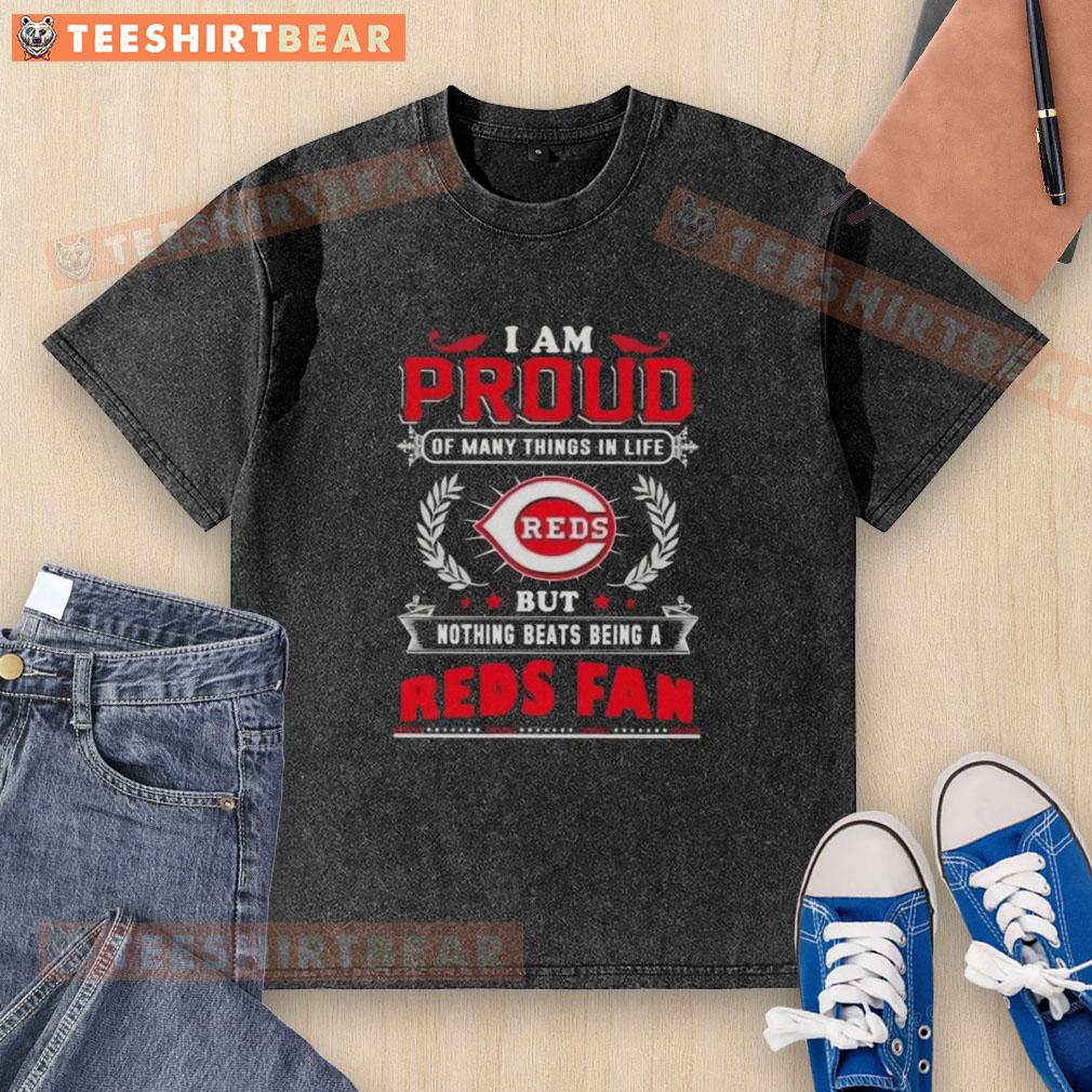 Alt Text: Cincinnati Reds fan wearing a washed t-shirt displaying pride with the phrase 'I Am Proud Of Many Things In Life.'