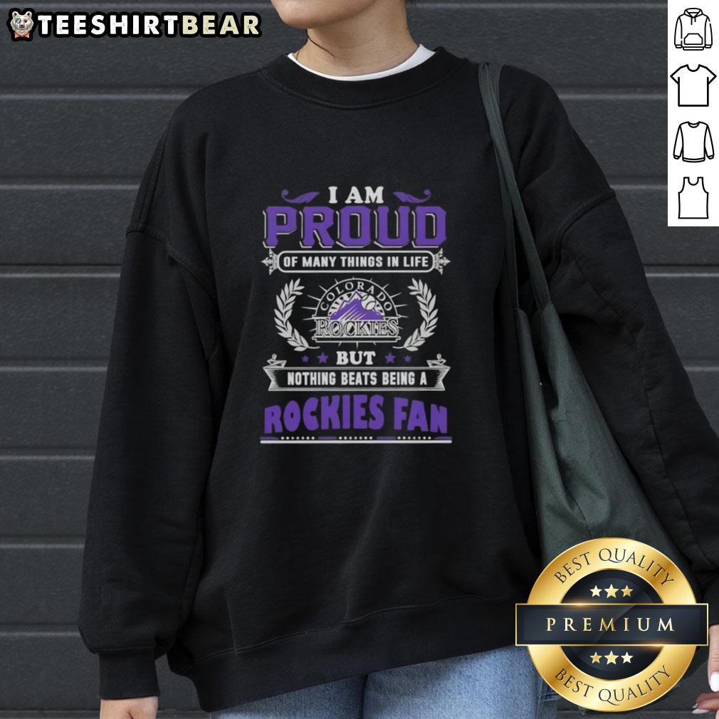 Cozy sweatshirt featuring 'I Am Proud Of Many Things In Life But Nothing Beats Being A Colorado Rockies Fan' design.