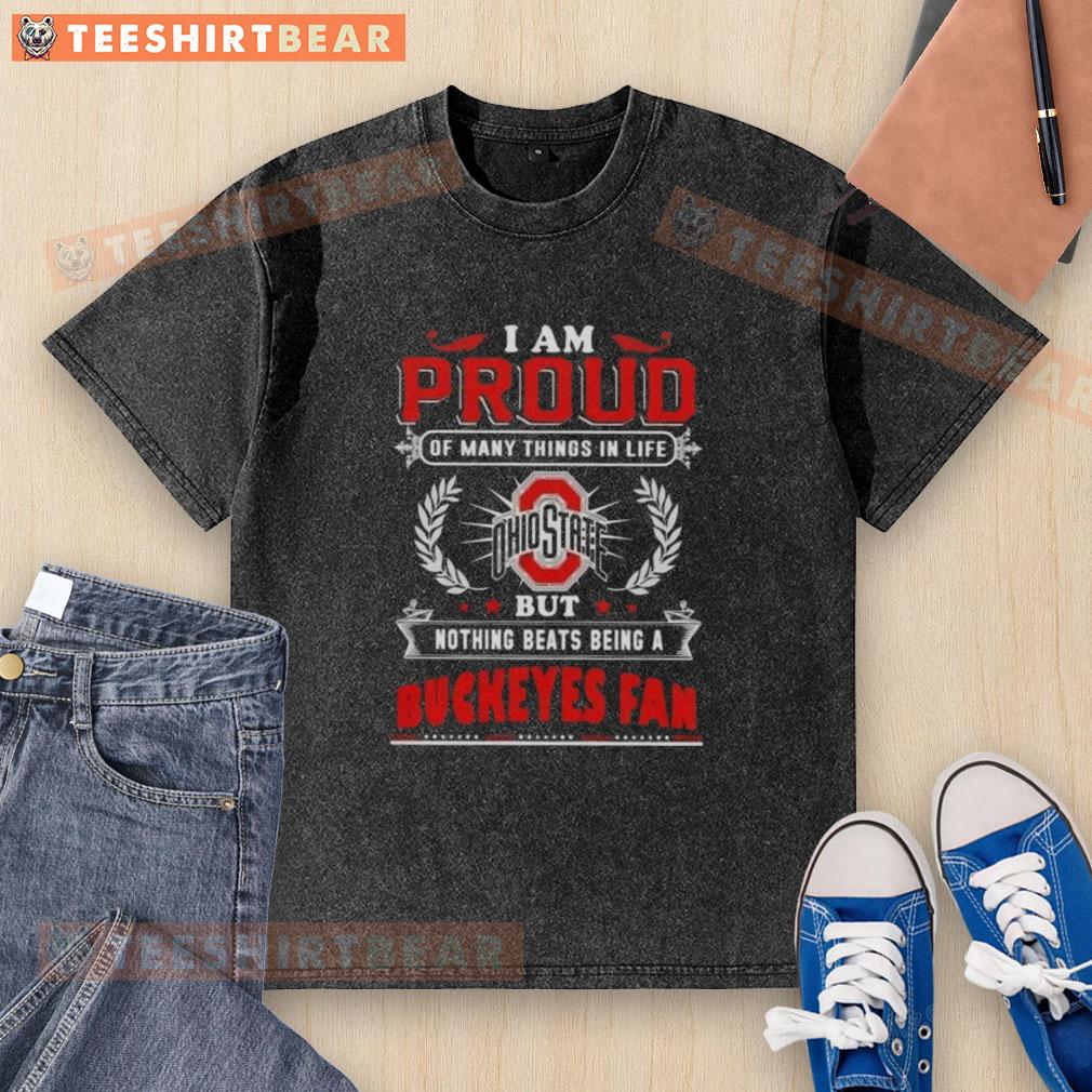 Alt Text: Ohio State Buckeyes fan washed t-shirt showcases pride with 'I Am Proud Of Many Things' slogan.