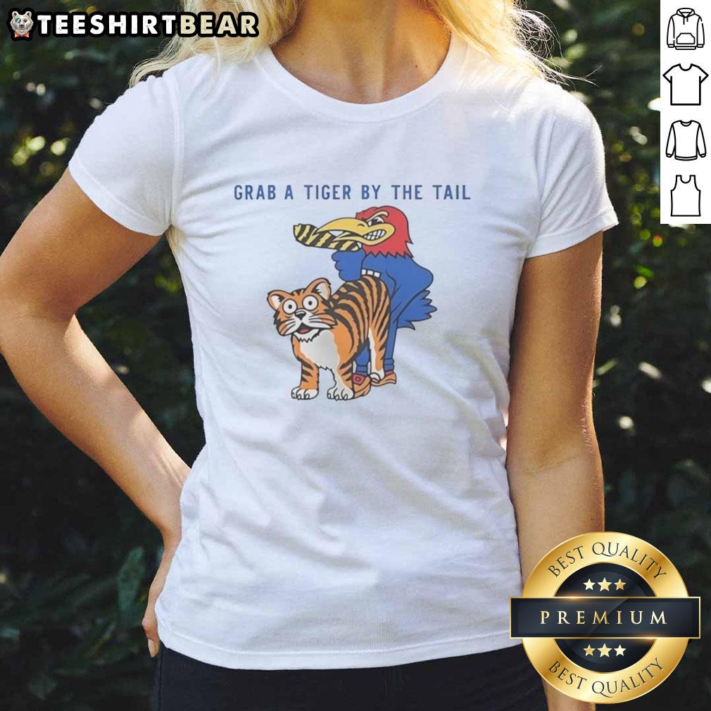 Official Kansas Jayhawks vs Missouri Tigers rivalry tee featuring a playful 'Grab A Tiger By The Tail' mascot design.