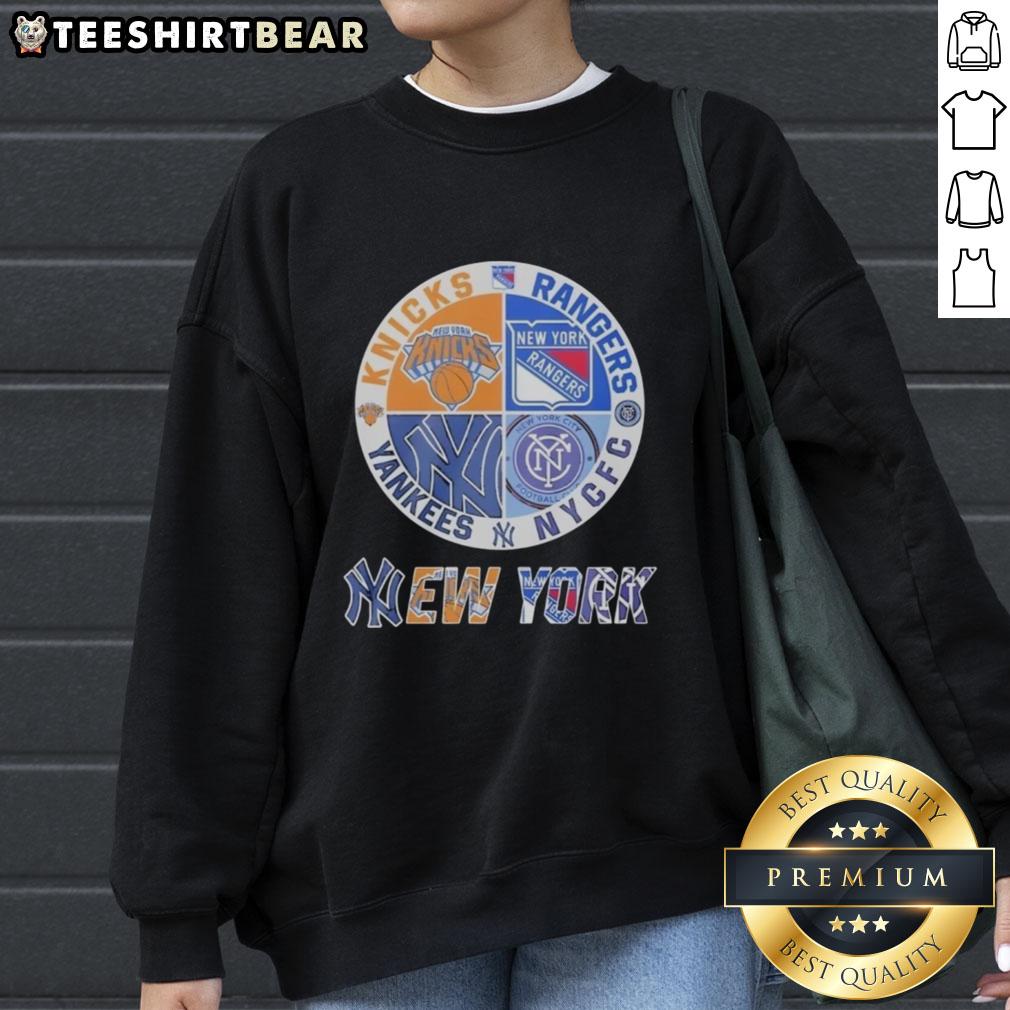 Official New York Knicks, Rangers, Yankees mashup logo sweatshirt showcasing iconic NYC sports team graphics.