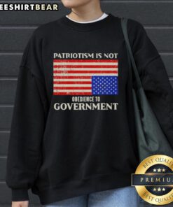 Official Patriotism Is Not Obedience To Government sweatshirt featuring a US flag design, perfect for patriotic expression.