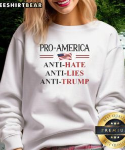 Pro-America Anti-Trump sweatshirt featuring a bold 'Resist' sign and flag design, perfect for expressing dissent.