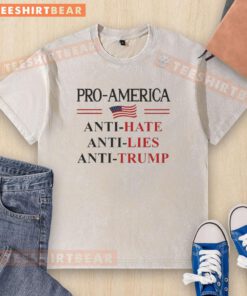 Pro-America anti-Trump sign on a washed t-shirt, showcasing resistance against hate and lies in a bold design.