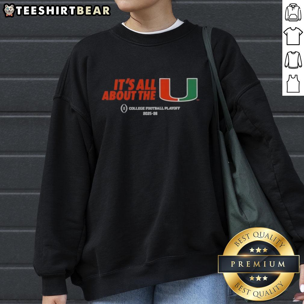 Alt Text: Original Miami Hurricanes Football 2025-26 CFP It's All About The U sweatshirt in vibrant orange and green colors.