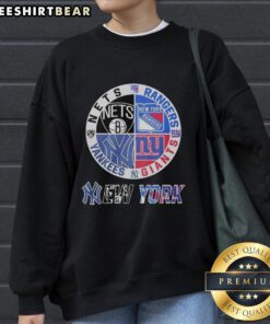 Original New York Giants Yankees Nets Rangers mashup logo sweatshirt featuring iconic team colors and designs.
