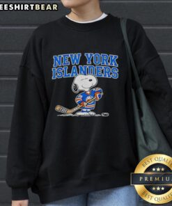 Original New York Islanders hockey Snoopy Peanuts 2026 sweatshirt featuring vibrant graphics and team colors.