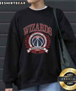 Original Washington Wizards NBA logo with laurel wreath frame on a retro sweatshirt design, perfect for basketball fans.