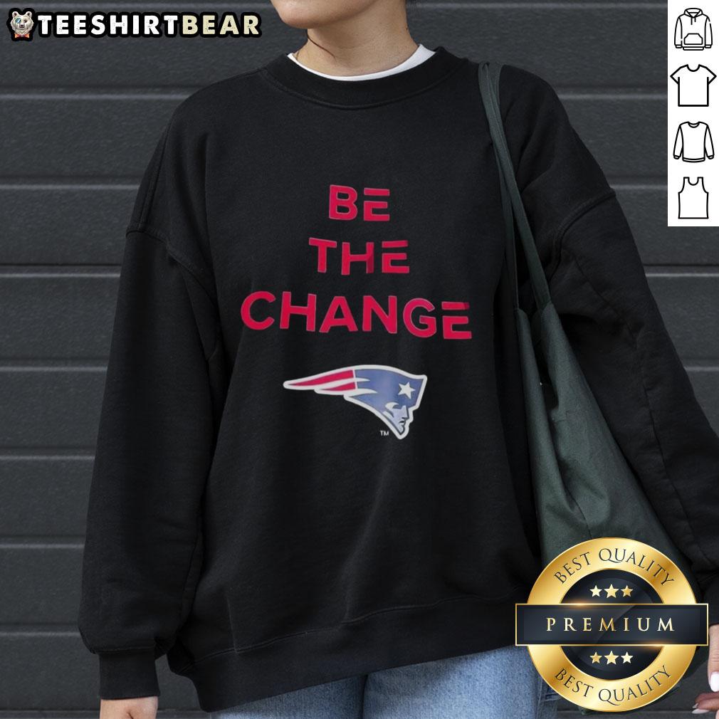 Alt Text: Premium Be The Change New England Patriots sweatshirt featuring team colors and logo for ultimate fan style.