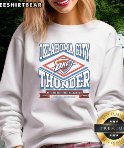 Alt Text: Premium Oklahoma City Thunder heater sweatshirt in navy blue, featuring the team's logo and a cozy design for fans.