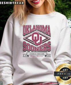 Premium Oklahoma Sooners heater sweatshirt in crimson, perfect for game day and staying warm during chilly weather.
