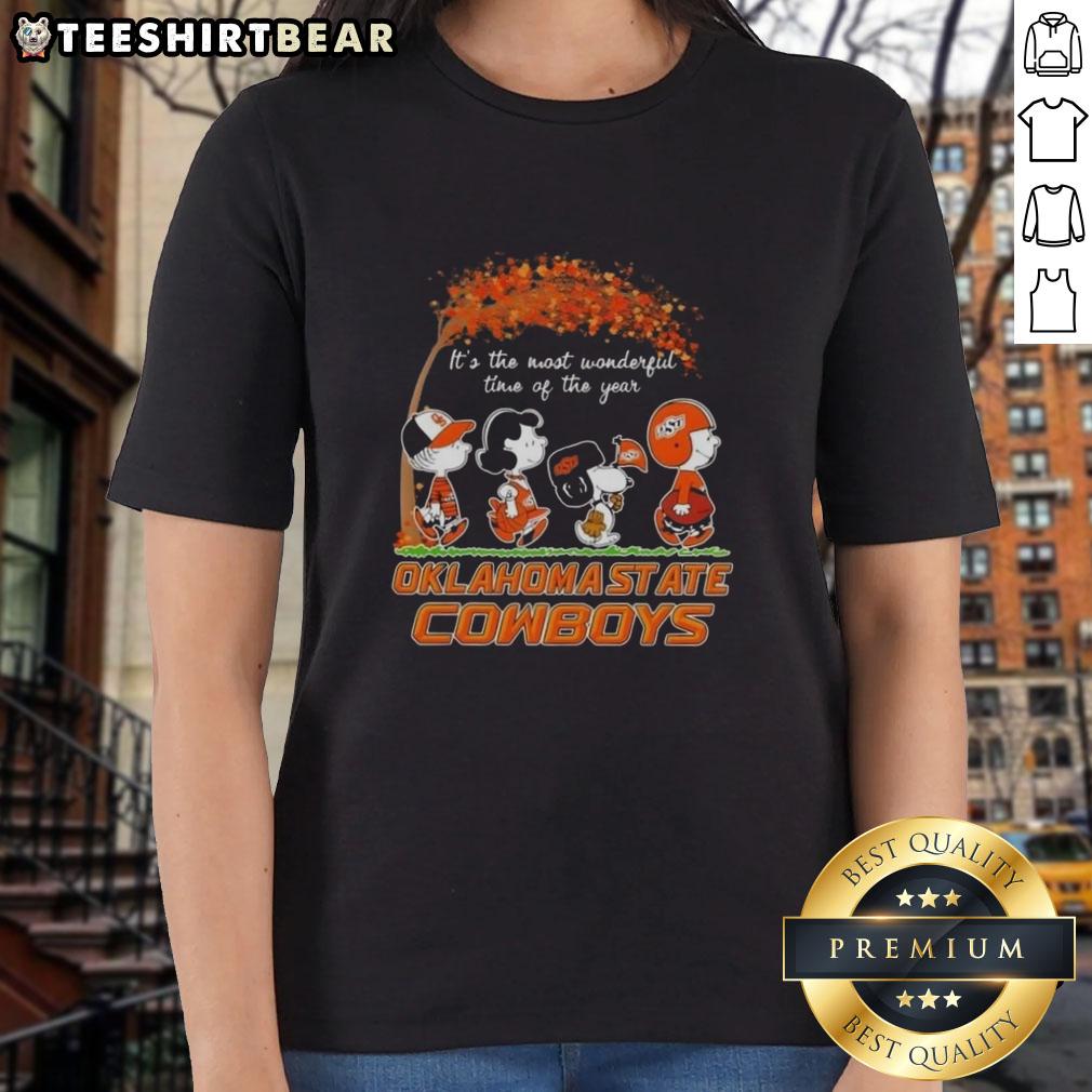 Premium Oklahoma State Cowboys X Peanuts Snoopy and Friends Autumn ladies tee featuring festive fall designs.