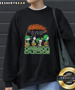 Alt Text: Premium Oregon Ducks X Peanuts Snoopy sweatshirt for autumn, celebrating the most wonderful time of the year.