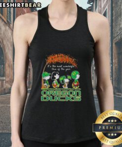 Alt Text: Premium Oregon Ducks X Peanuts Snoopy and Friends autumn tank top, perfect for celebrating the most wonderful time of year.