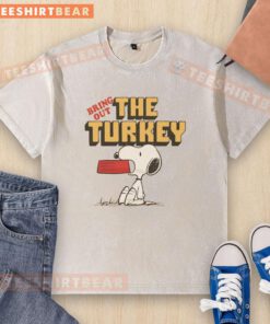 Premium Peanuts Snoopy Bring Out The Turkey washed t-shirt featuring a fun Thanksgiving design with Snoopy.