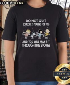 Alt Text: Premium Peanuts tee featuring 'Do Not Quit' message and prayer theme for encouragement during tough times.
