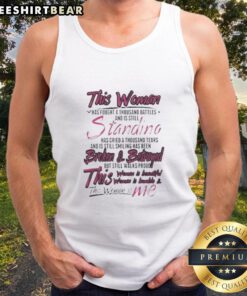 Alt Text: Woman wearing a tank top that reads Fought a thousand battles, cried a thousand tears, still smiling in a serene setting.
