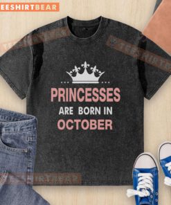 October birthday girls wear the Pretty Princesses Are Born In October washed t-shirt, showcasing a fun and festive design.