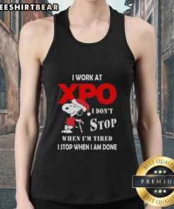 Alt Text: Pretty Snoopy Christmas tank top with 'I work at XPO, I dont stop when Im tired, I stop when I am done' text.