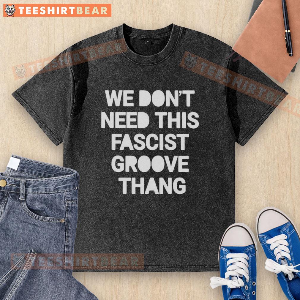 Alt Text: Pretty We Don't Need This Fascist Groove Thang washed t-shirt design featuring bold graphics and vibrant colors.