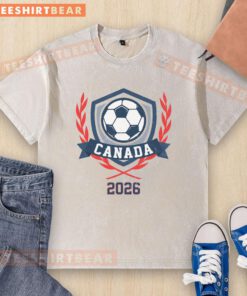 Vintage 2026 Canada soccer crest on a washed t-shirt, showcasing a stylish design for soccer fans and collectors.