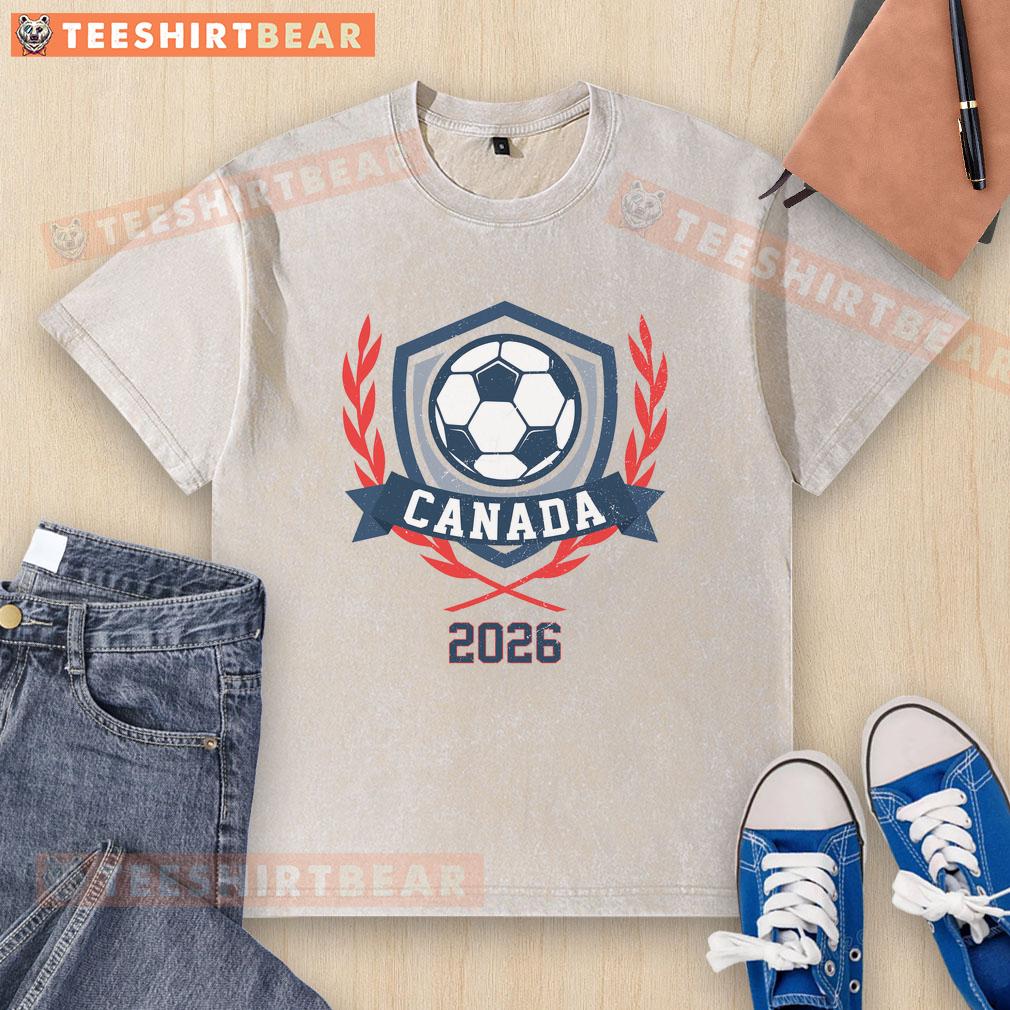 Vintage 2026 Canada soccer crest on a washed t-shirt, showcasing a stylish design for soccer fans and collectors.