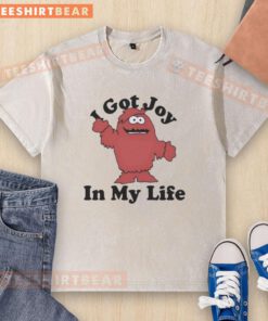 Top Cookie Monster I Got Joy In My Life washed t-shirt displayed on a hanger, perfect for casual wear and fans of Sesame Street.
