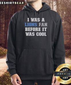 Cozy 'I Was A Lions Fan Before It Was Cool' hoodie, perfect for showing team pride and staying stylish on game day.