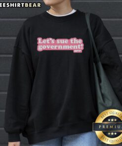 Stylish Top Lets Sue The Government Sweatshirt in black, perfect for casual wear and expressing bold opinions.