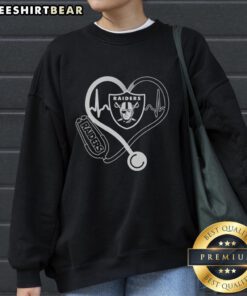 Alt Text: Top Love Los Angeles Raiders stethoscope headphones fans sweatshirt featuring team colors and logo, perfect for fans.