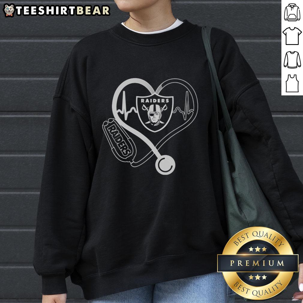 Alt Text: Top Love Los Angeles Raiders stethoscope headphones fans sweatshirt featuring team colors and logo, perfect for fans.