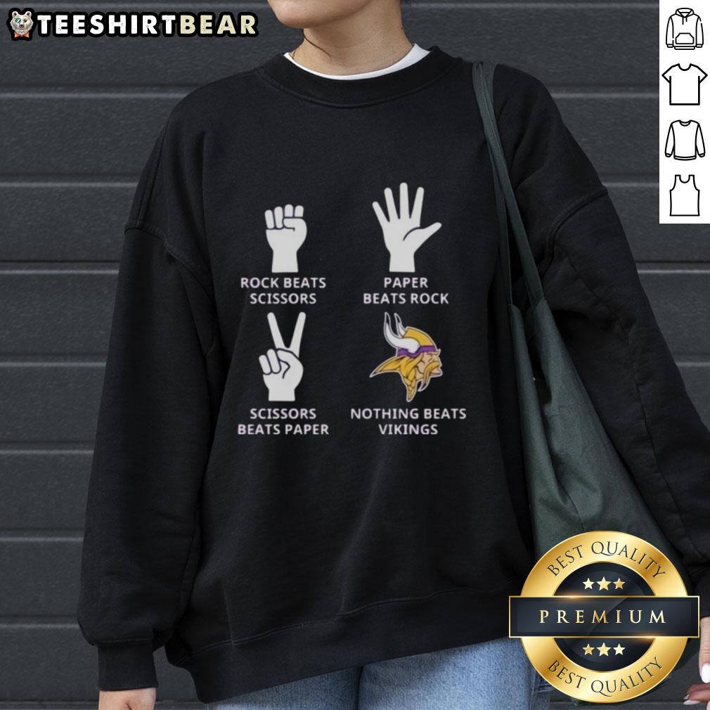 Cozy Minnesota Vikings sweatshirt featuring 'Nothing Beats Rock, Scissors, Paper Beats Rock, Scissors Beats Paper' design.