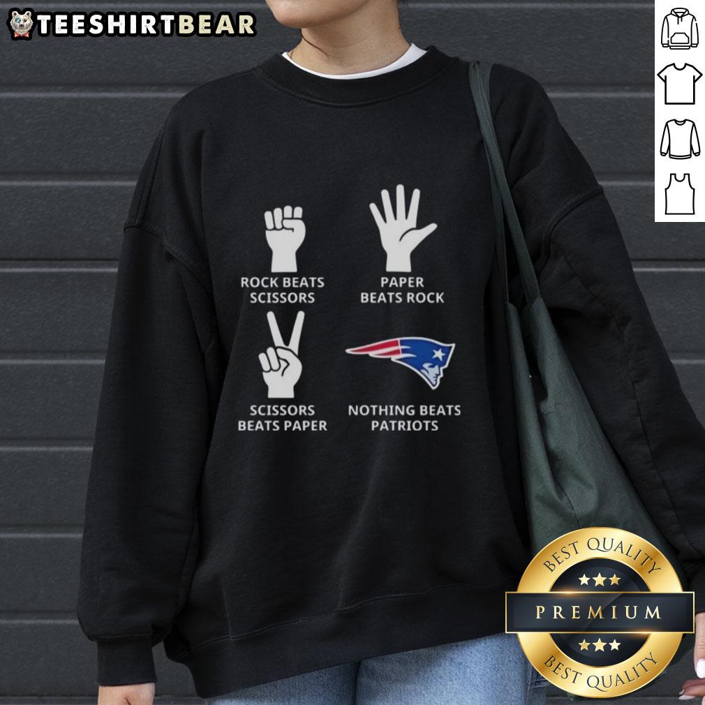 Alt Text: Top New England Patriots sweatshirt featuring a fun Rock, Paper, Scissors design for fans and gamers.