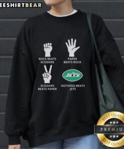 Cozy New York Jets sweatshirt featuring 'Nothing Beats Rock Beats Scissors Paper Beats Rock Scissors Beats Paper' design.