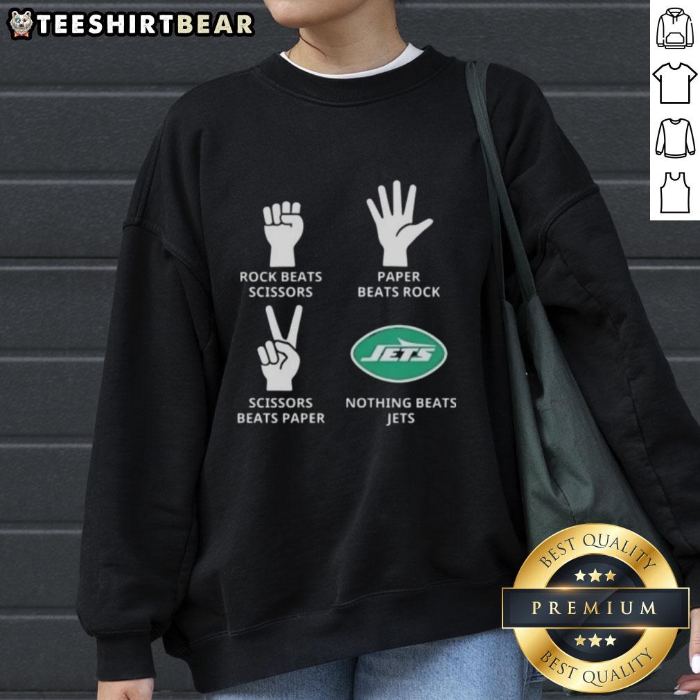 Cozy New York Jets sweatshirt featuring 'Nothing Beats Rock Beats Scissors Paper Beats Rock Scissors Beats Paper' design.