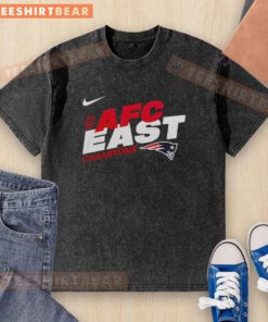 Alt Text: Awesome New England Patriots 2025 NFC East Champions Super Bowl LX mascot washed t-shirt displayed on a hanger.