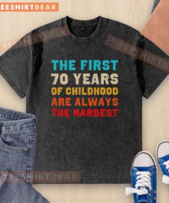 Vintage washed t-shirt featuring 'Awesome: The First 70 Years of Childhood Are Always the Hardest' design.