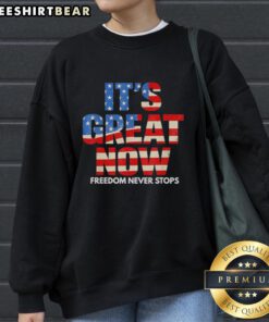 Awesome USA Flag Patriotic Sweatshirt featuring 'Freedom Never Stops' design for stylish, patriotic fashion lovers.