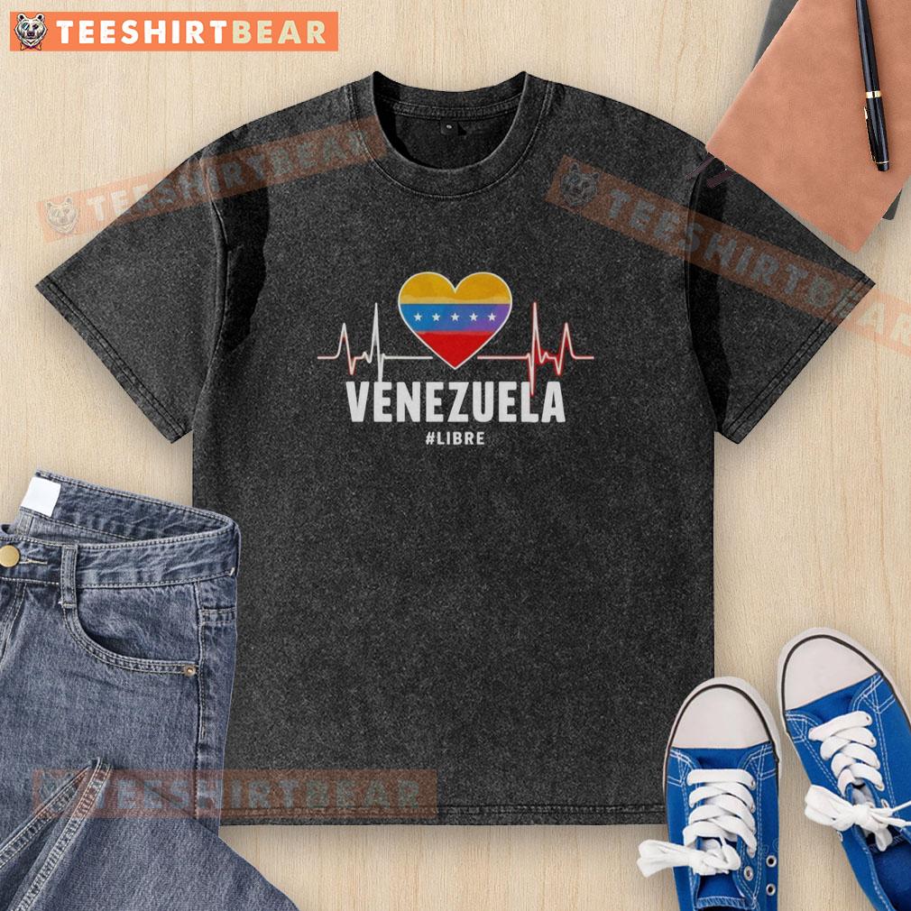 Alt Text: Heart-shaped design on a washed t-shirt featuring 'Awesome Venezuela' and 'Libre Heartbeat' for stylish casual wear.