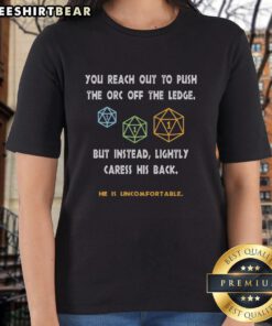 Funny ladies tee featuring an orc being gently caressed instead of pushed off a ledge, perfect for fantasy lovers.