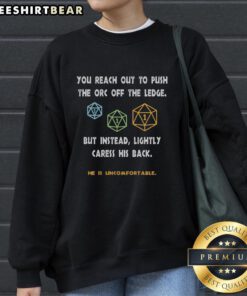 Reach out to push the orc off the ledge but caress his back sweatshirt in a humorous fantasy scene.