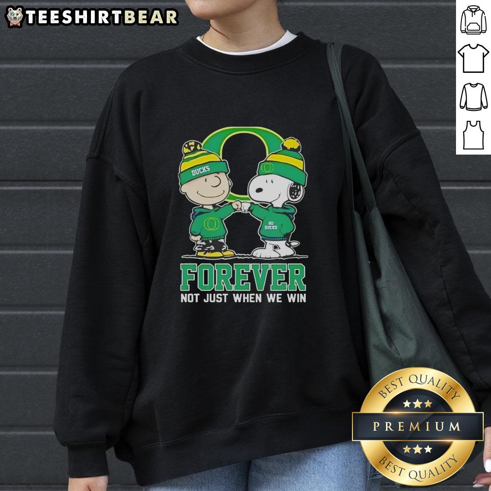 Cute Peanut Snoopy and Charlie Brown on Oregon Ducks Forever sweatshirt, perfect for fans and cozy style.