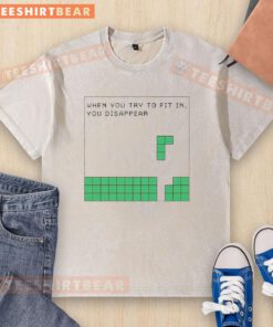Alt Text: Cute washed t-shirt with 'When you try to fit in, you disappear' text design, perfect for casual wear.