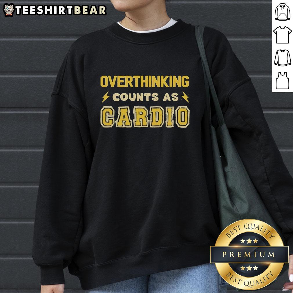 Funny sweatshirt saying 'Good Overthinking Counts as Cardio' perfect for gym lovers and humor enthusiasts.