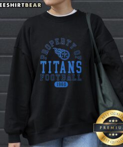 Cozy Tennessee Titans sweatshirt featuring 'Good Property of Tennessee Titans Football Since 1960' design.