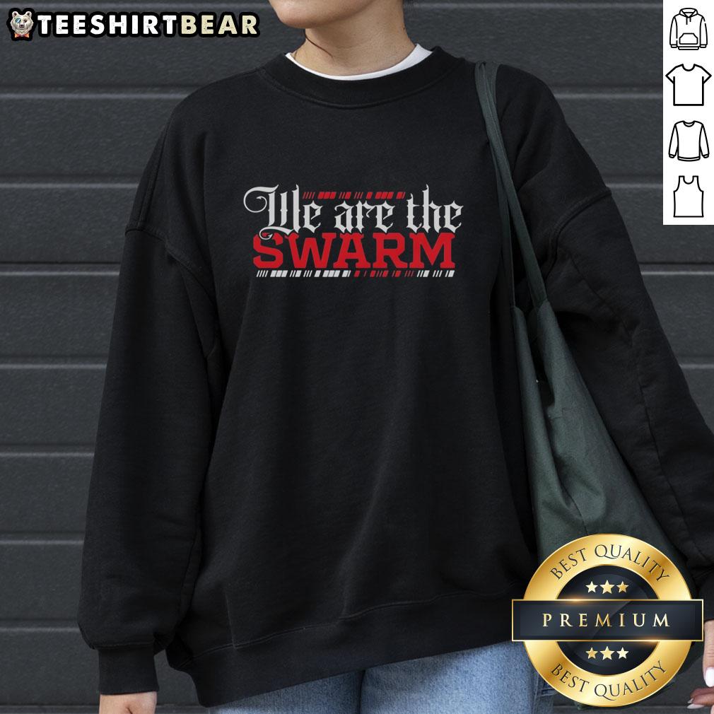 Good We Are The Swarm Sweatshirt featuring bold graphic design in vibrant colors, perfect for casual streetwear style.