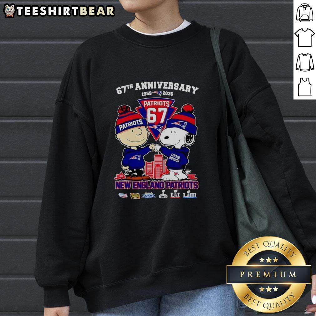 Alt Text: Snoopy and Charlie Brown celebrating 67 years of New England Patriots football on a cozy sweatshirt.