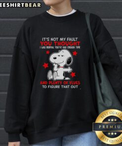 Happy Snoopy sweatshirt with 'It's not my fault you thought' text, perfect for fans of Peanuts and casual wear.