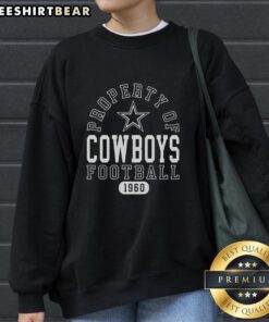 Dallas Cowboys Football sweatshirt, celebrating the team's legacy since 1960, featuring bold graphics and cozy design.